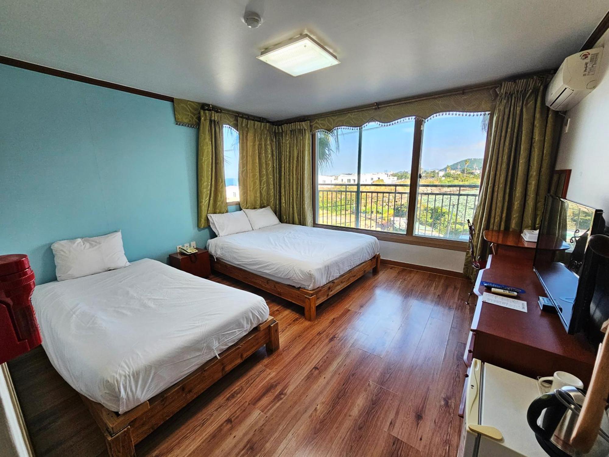 Sea Cliff Hotel Jeju Quarto foto